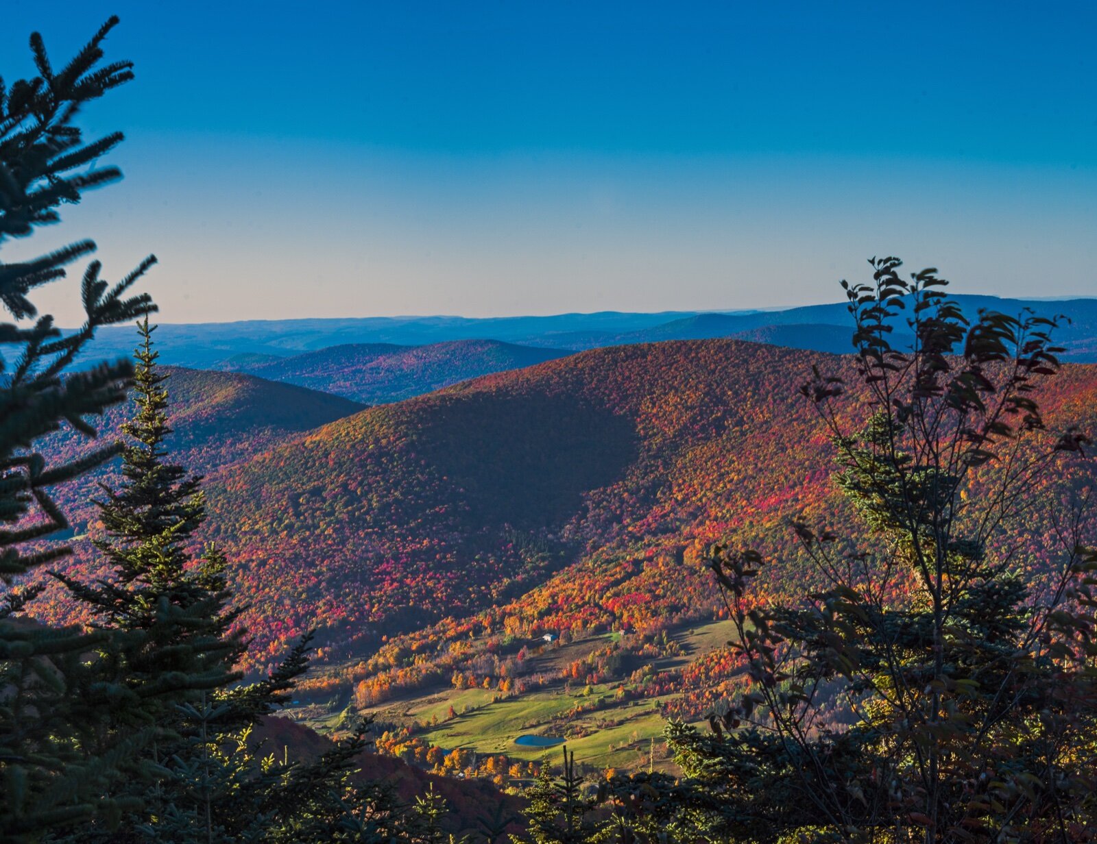 Autumn colour across the forested ridges of the Catskill Mountains in upstate New York